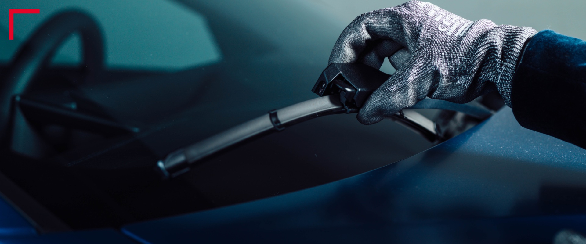 Hand in glove pulling wiper Image