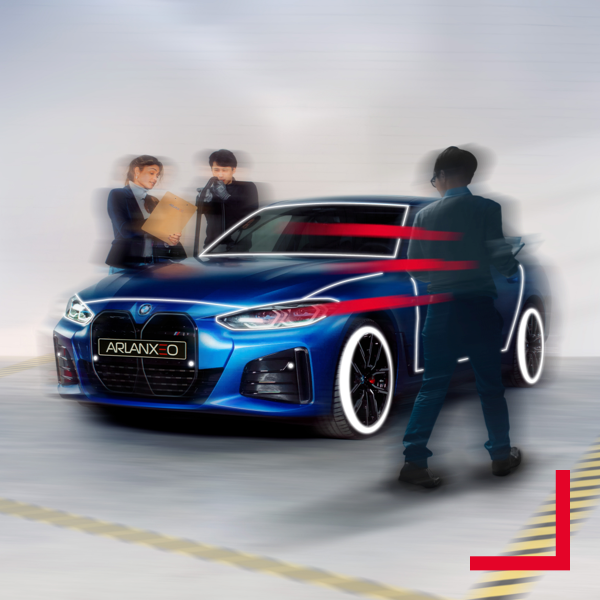 People looking at car with stripes Image